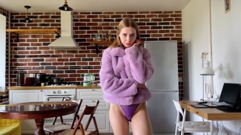 Hot bitch in purple fur coat likes cum on her pretty face